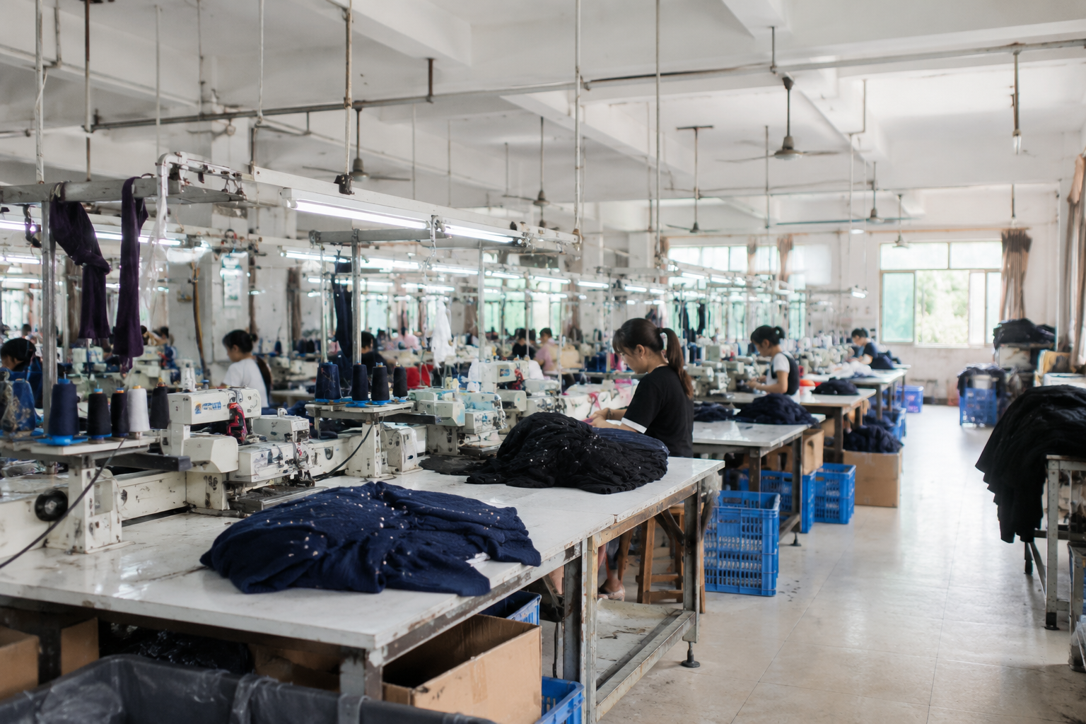 Factory production floor with knitting equipment